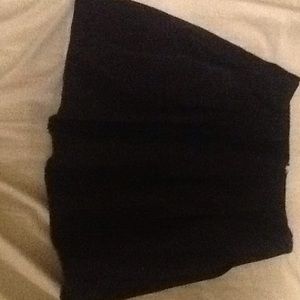 Black size 2 skirt that has been used.